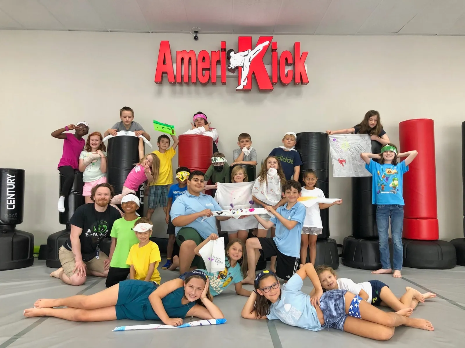 Kids playing tug of war during Amerikick summer camp